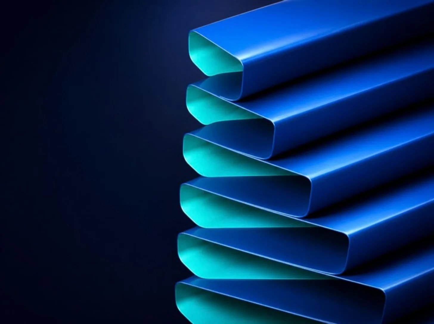 Cintas azules plegadas en capas sucesivas sobre fondo azul noche.